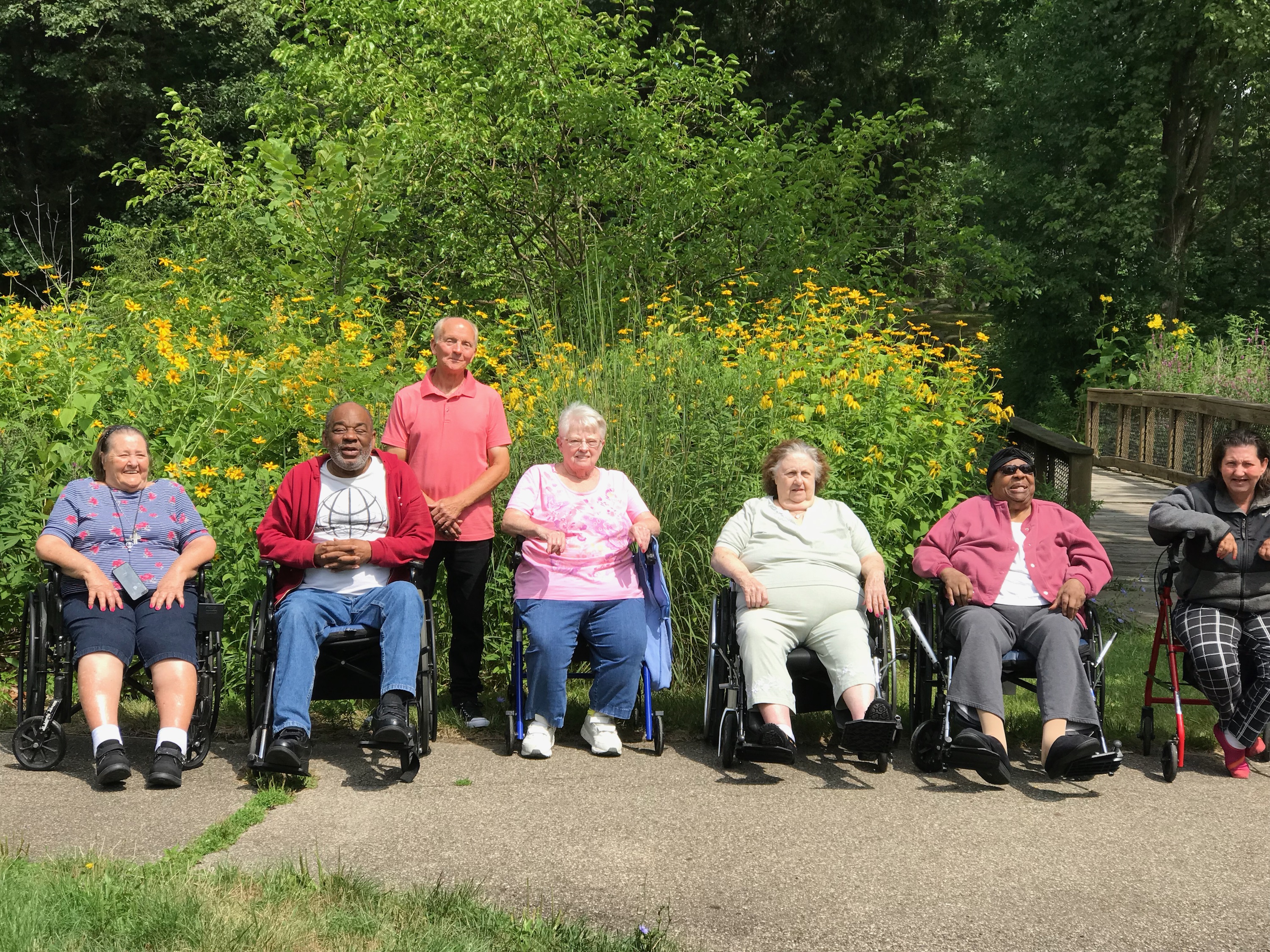 residents group picture at the park